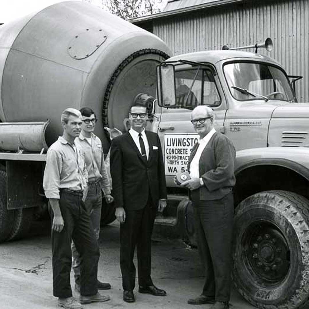 Historic photo of Livingston's team members in front of a company mixer truck